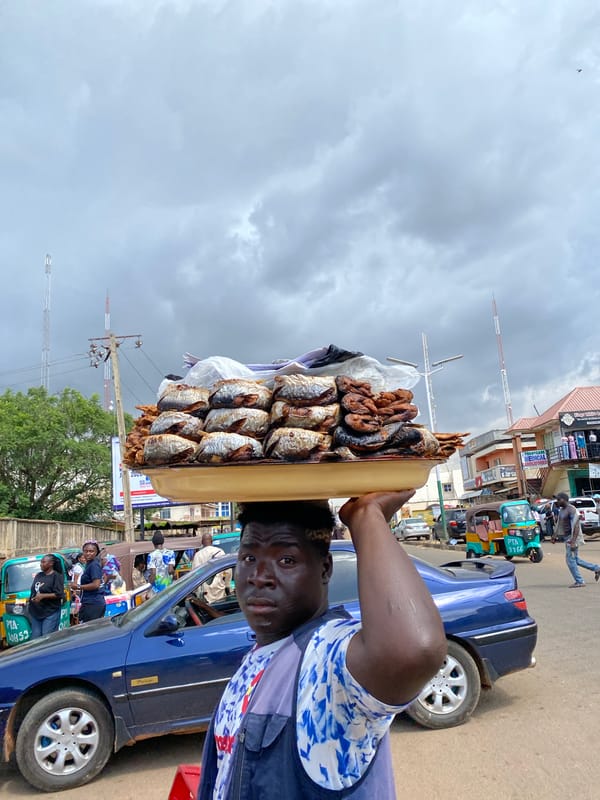 Everyday street life across Jos markets and commercial areas