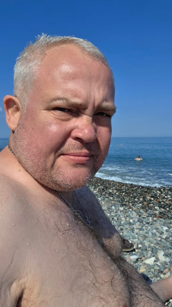Summer morning on Batumi's Black Sea pebble beach