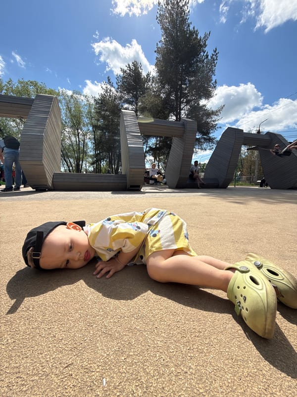 Family enjoys morning playground visit in Rusanovo, Russia