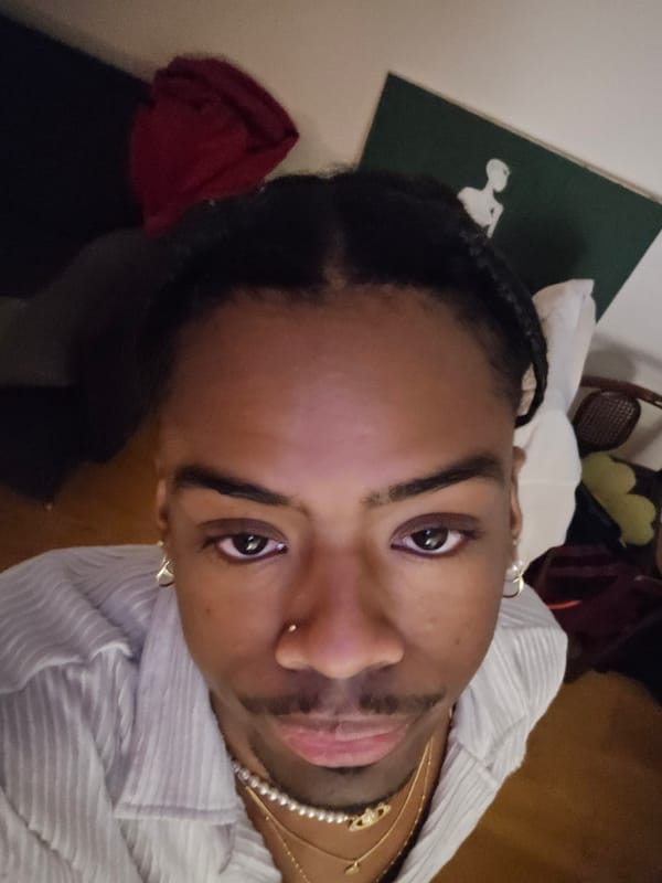 Portrait captured in Pantin showing person with braids and jewelry