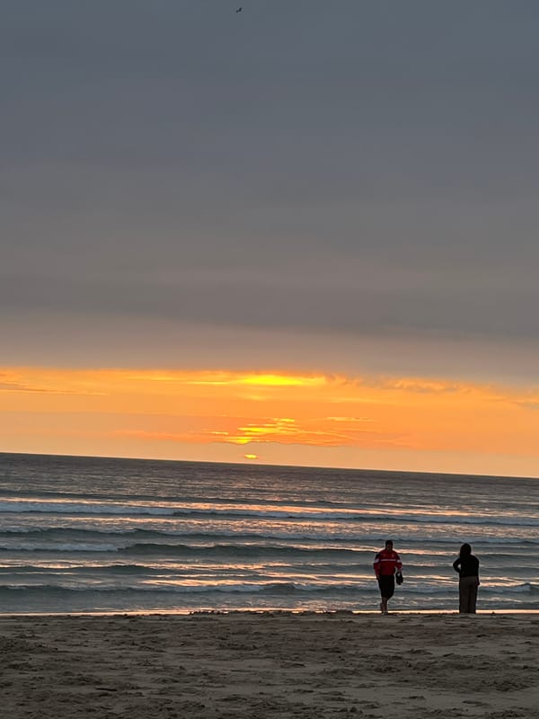 Sunset beach walk captured in A Coruña, Spain
