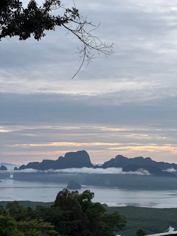Misty bay views over Ban Hin Rom's mangrove coastline
