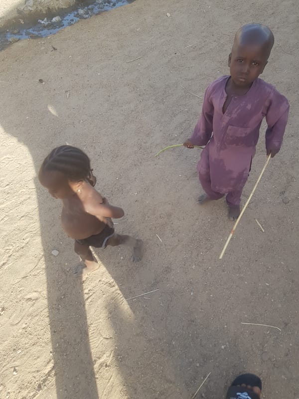 Daily life captured on dirt streets of Dutsinma B