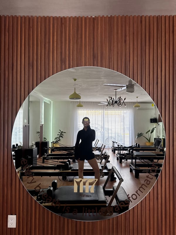 Pilates session documented at mirrored studio in Puebla