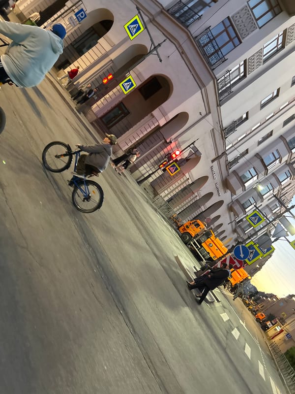 Dusk in a European city: bikes, trams, and street life