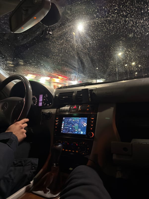 Driver navigates through night weather conditions