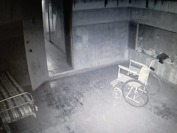 Inside an abandoned Bishkek building, late-night security footage