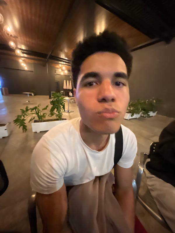 Young man takes selfie in Mexican restaurant early morning