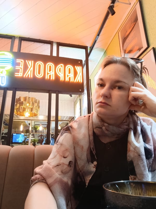 Woman documents sushi lunch in Chaikovsky restaurant