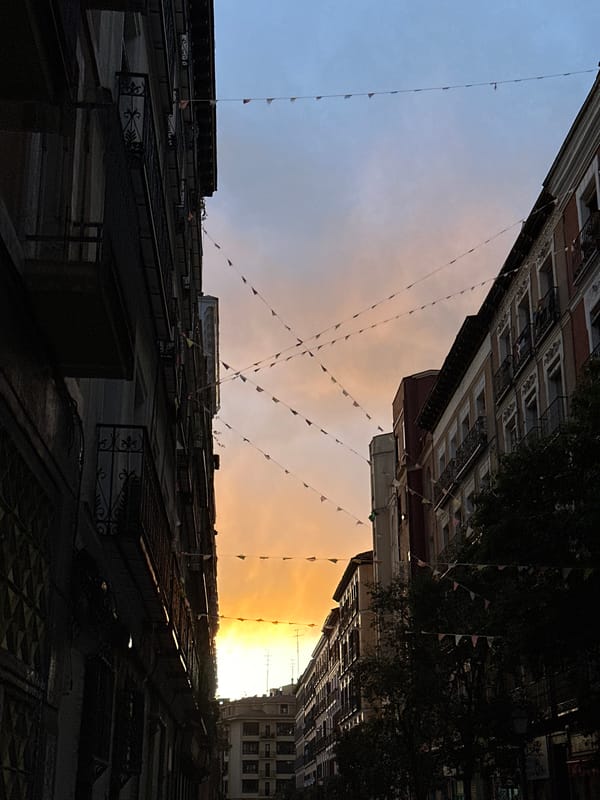 Evening stroll through Madrid streets documented with churros cafe stop