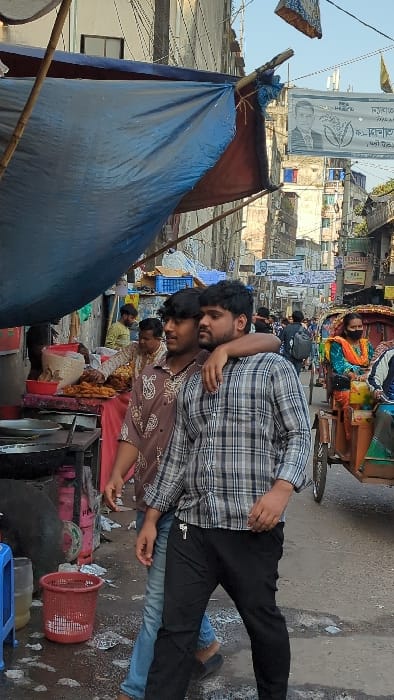 Typical morning street commerce documented across Dhaka commercial districts