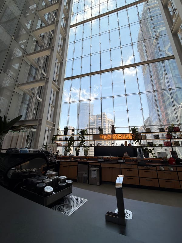 Inside Meta's Tel Aviv office, cafe and lobby logo