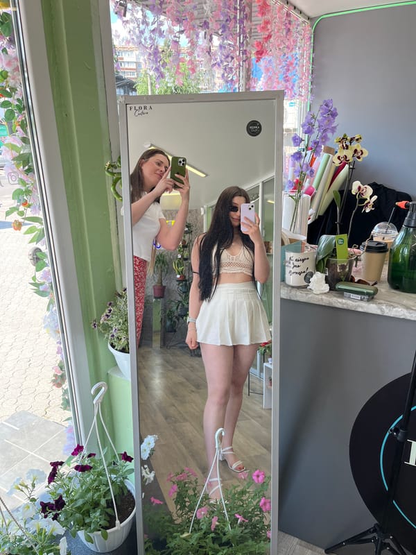 Woman shops for flowers in Ukrainian floral boutique