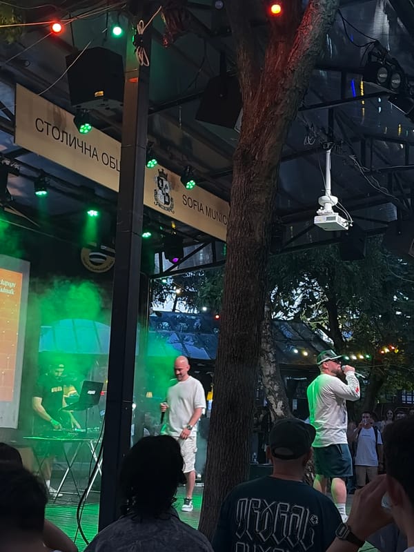 DJ set underway at a covered outdoor event