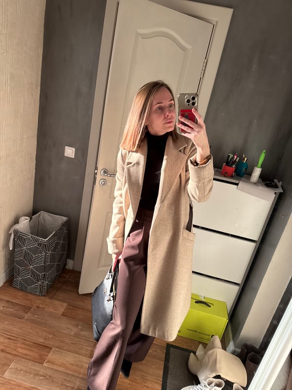 Woman takes mirror selfie in Perm apartment