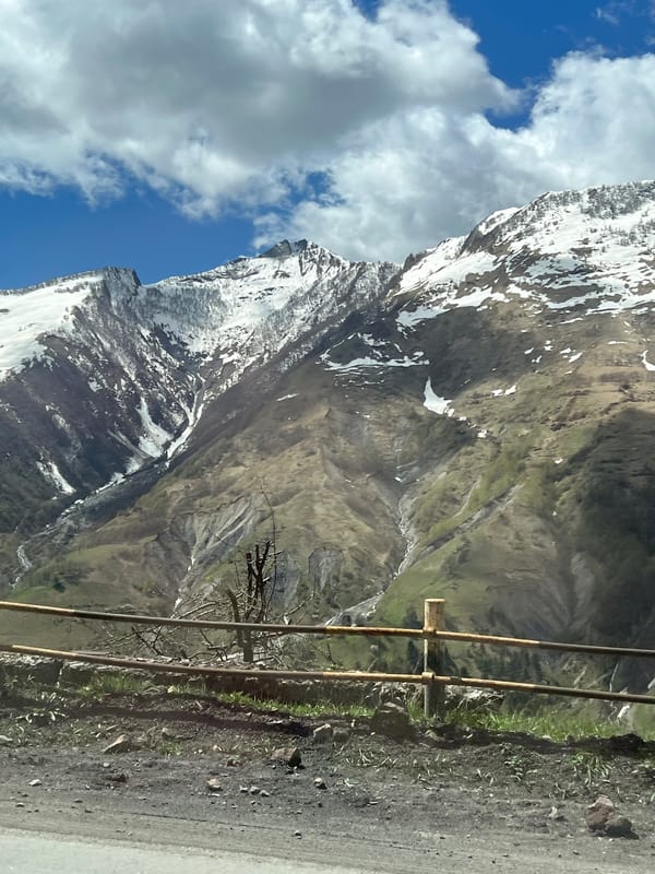 Mountain landscape with snow-capped peaks observed in Zemo Mleta, Georgia