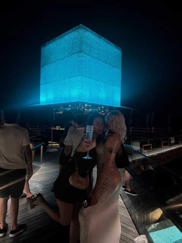 Nightclub party documented in Kuta Selatan with dancing women
