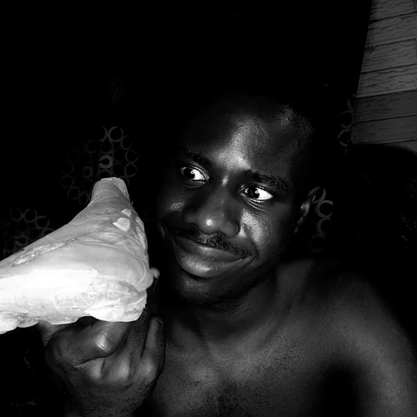 Person photographed with soccer cleat in Narayi, Nigeria