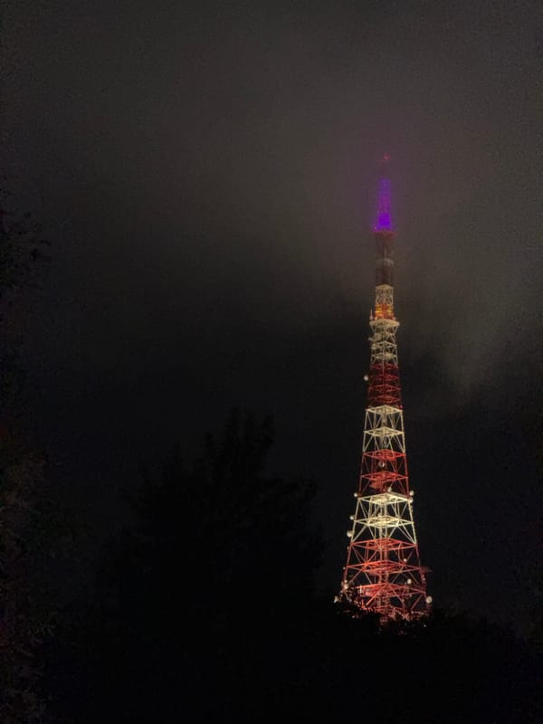 Foggy night illuminates telecommunications tower in Birobidzhan, Russia