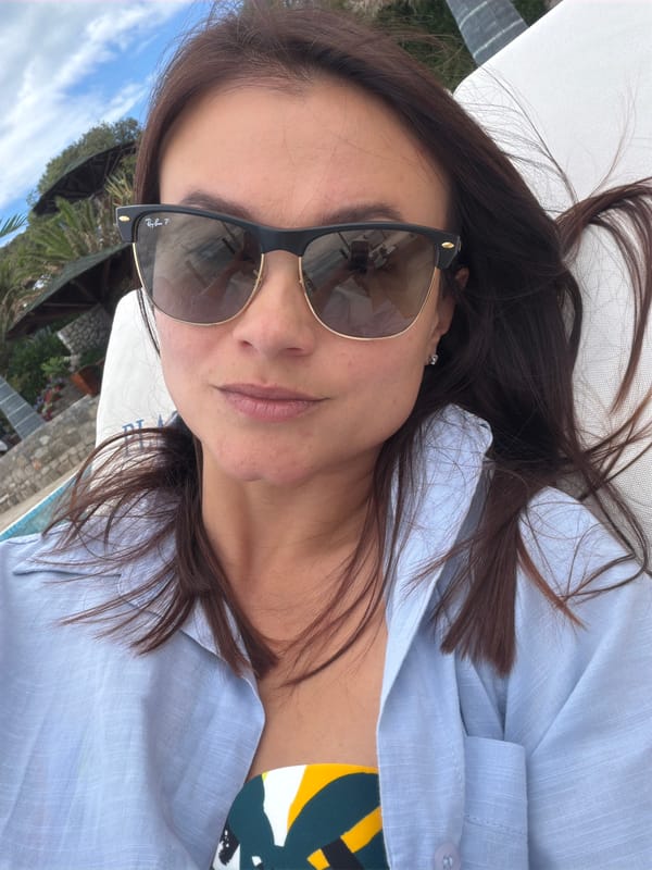 Woman enjoys leisurely Sunday afternoon by Montenegro coast