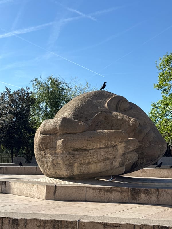 Paris morning scenes feature stone sculpture and Gothic architecture