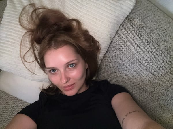 Couch night with popcorn, a laptop, and late-evening vibes
