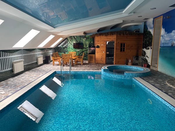 Indoor pool and village greenery in Davydovka, Ukraine