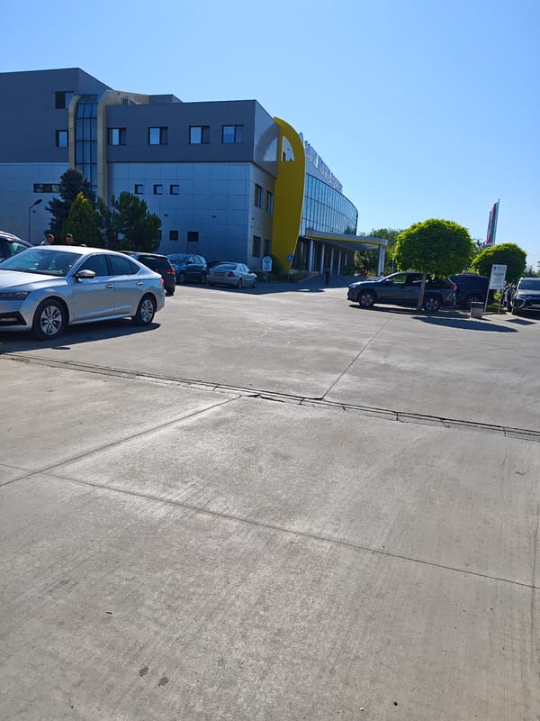 Morning stroll around Hotel Pleven's modern exterior