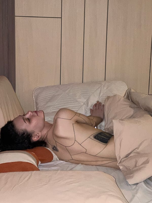 Woman in curled position observed on bed in Kazan