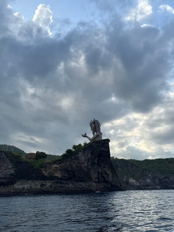 Cliff sculptures photographed from multiple angles in Nusa Penida