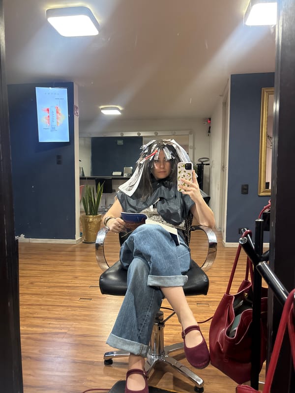 Woman receives hair treatment at Puebla salon