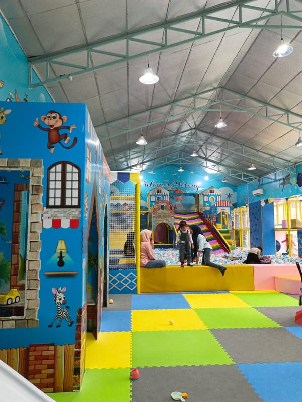 Children play at indoor playground facility in Cotbadatunong