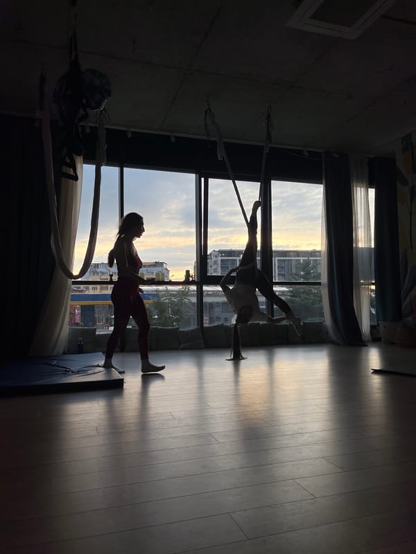 Aerial yoga sessions capture Sofia sunset from studio windows