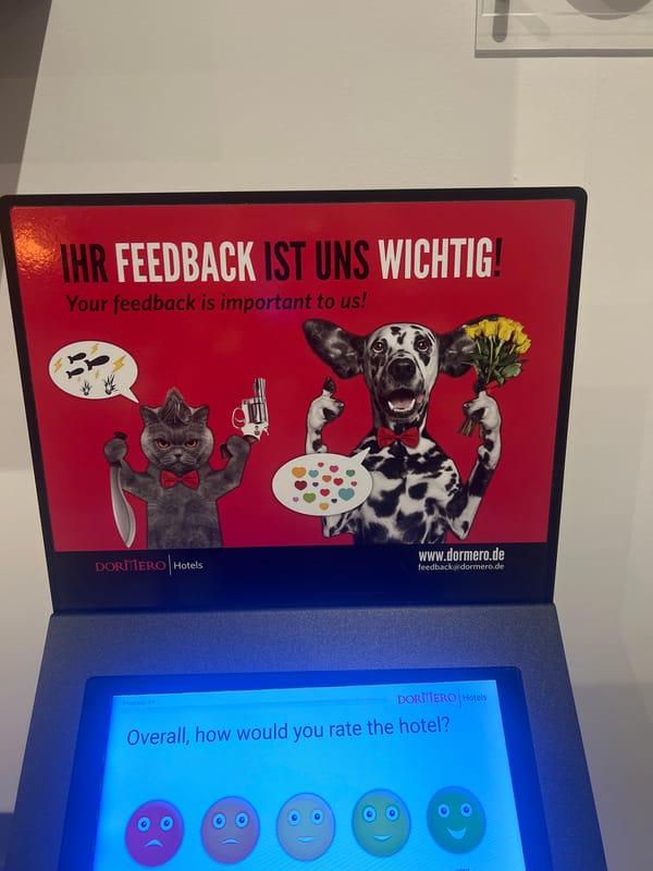 Hotel feedback station displays unusual cartoon advertisement in Budapest