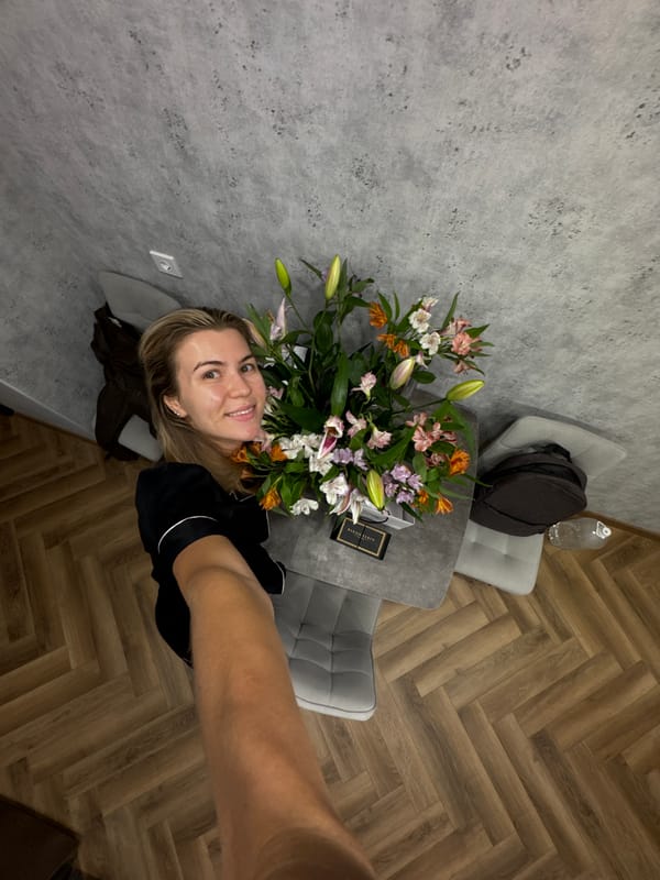 Indoor celebration with flowers, 23rd birthday decorations, stones documented