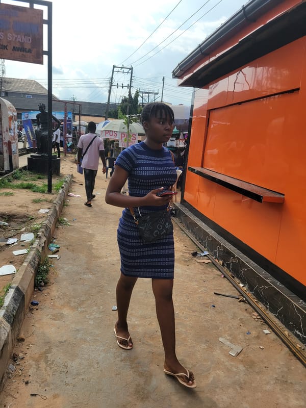 Afternoon street and market activity in Egbagu, Nigeria
