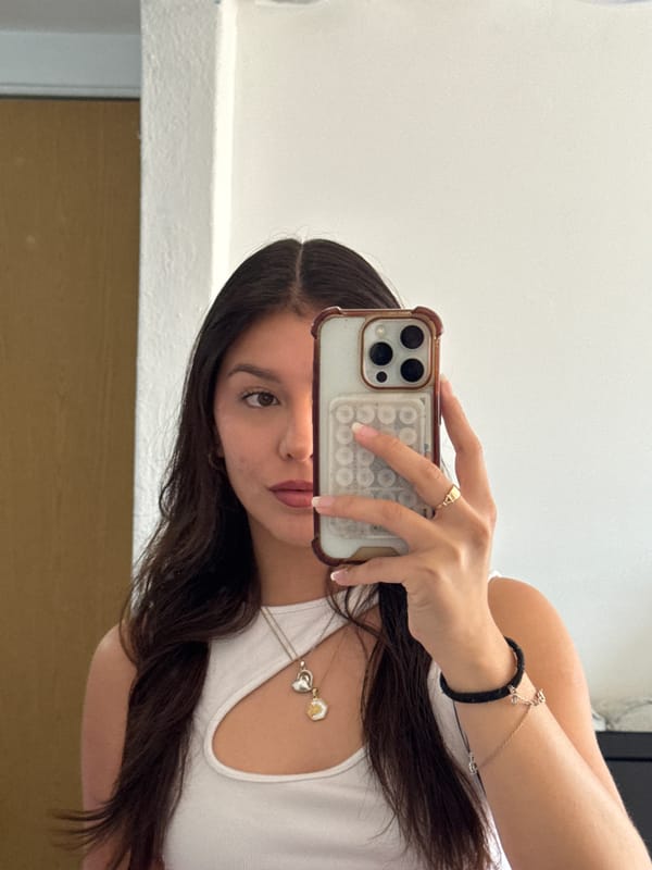 Woman takes mirror selfie in Paraje el Ciruelar, Mexico