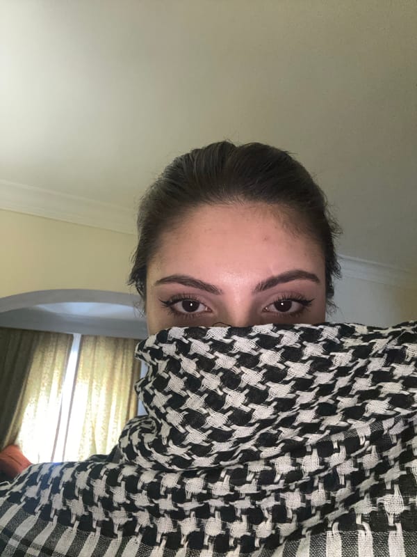 Woman photographed multiple times in urban interior setting