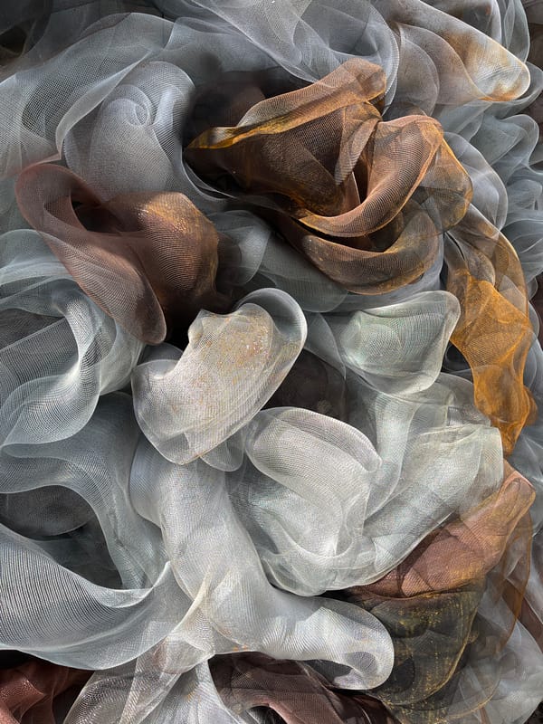 Metallic mesh materials arranged in artistic display in Krasnoyarsk