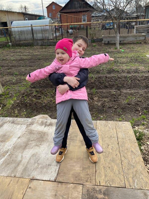 Family documents spring day activities in Chaikovsky, Russia