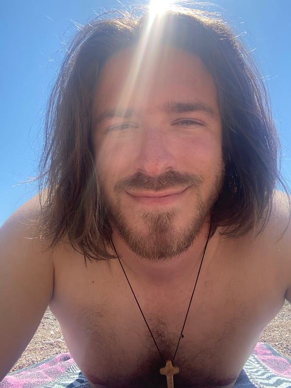 Man enjoys sunny beach day in Sutomore, Montenegro