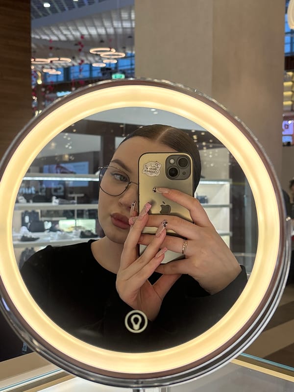 Retail worker takes selfies during break at Russian mall