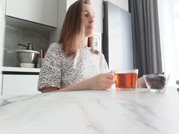 Woman observed in kitchen during morning hours in Chaikovsky