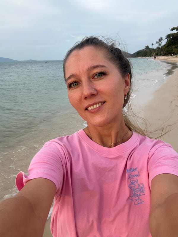 Ko Samui beach at dusk, clouds and calm waves