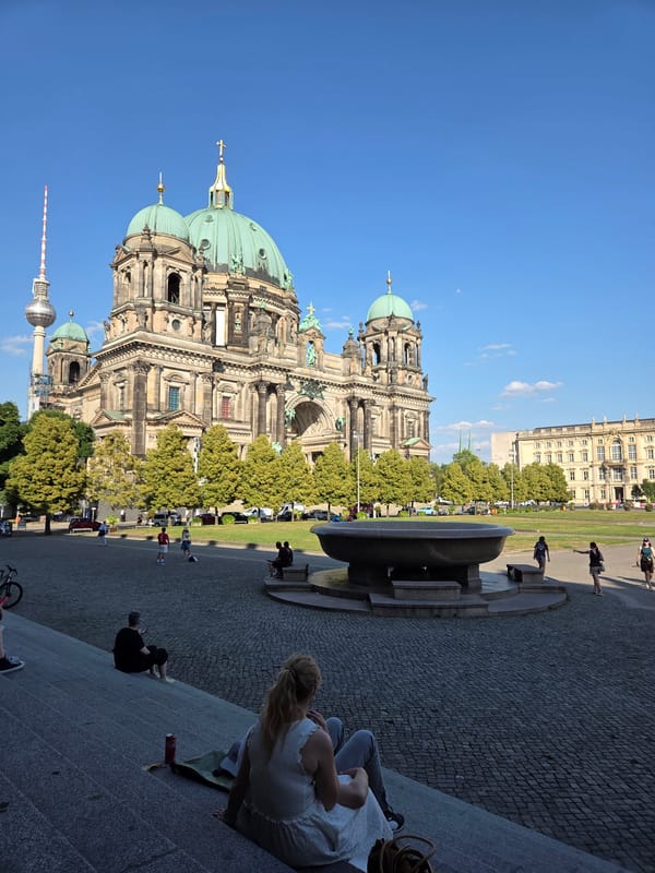 Sunny afternoon at Berlin Cathedral with fountains and balloons