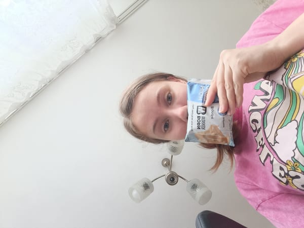 Person enjoys protein snacks in Razgrad, Bulgaria