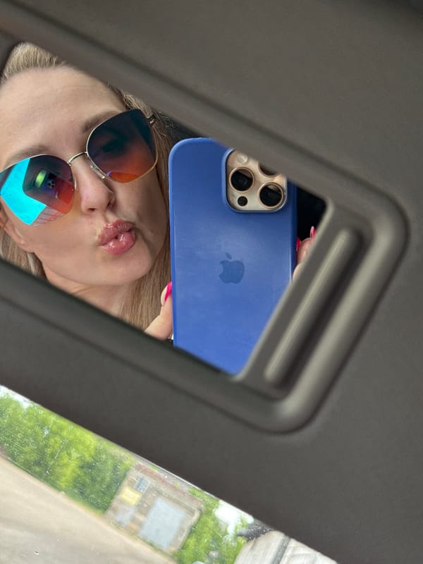 Person takes sunroof selfie with iPhone in Chaikovsky, Russia