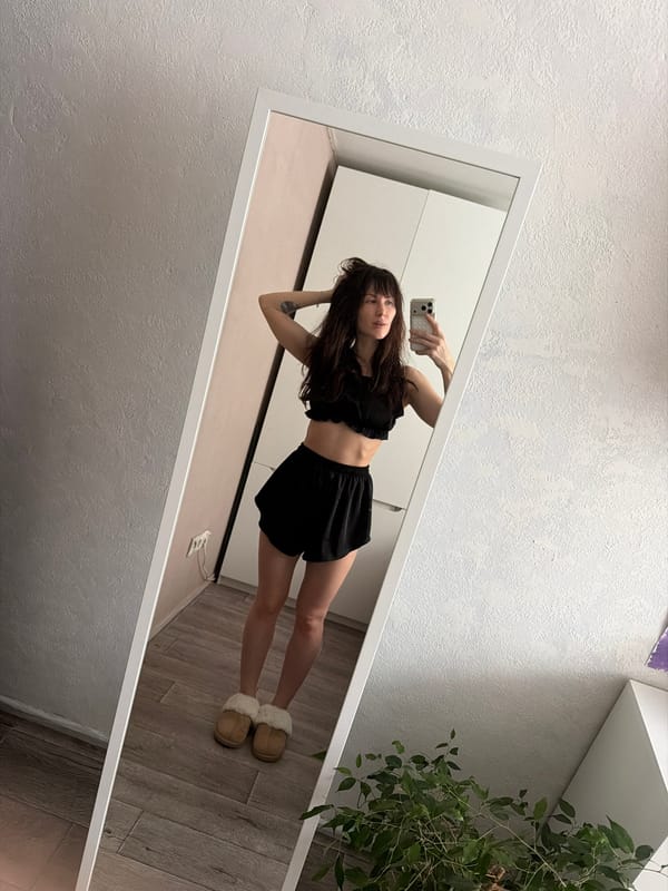 Woman takes mirror selfie in Perm, Russia