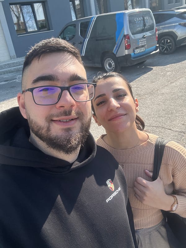 Couple takes selfie outside building in Ruse, Bulgaria