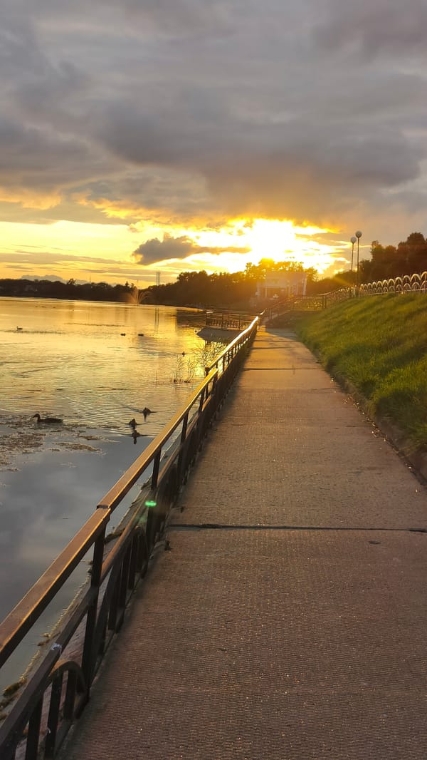 Sunset observed over lake walkway in Myory, Belarus